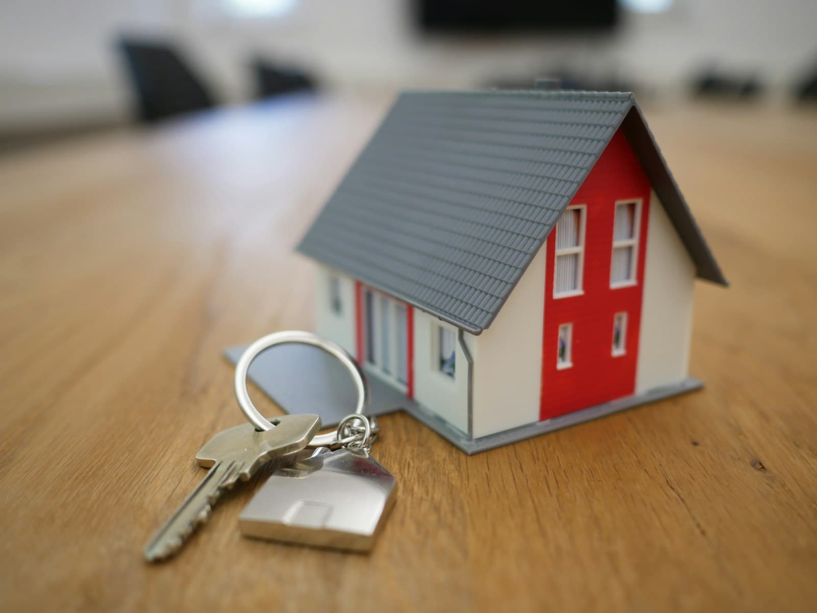 House keys on a table — home services under one roof